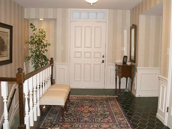 Large foyer with slate flooring