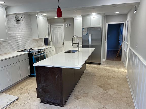 New Kitchen,Gas Stove, Dishwasher, Travertine floors, New cabinets, Quartz Countertop, Stainless Steel appliances