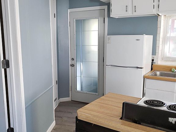 Back door to patio and backyard