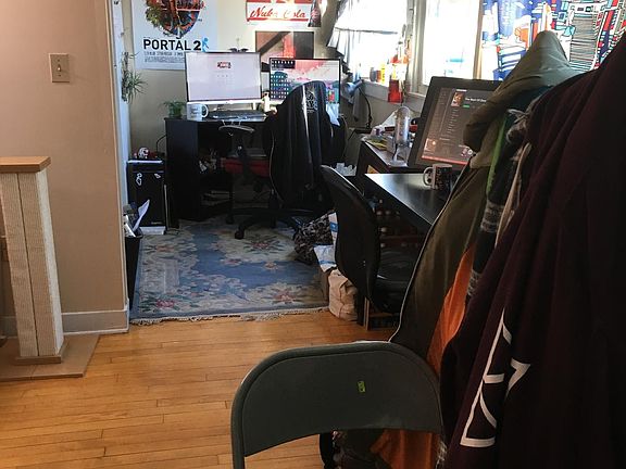 Main living area into kitchen. Taken from entryway.