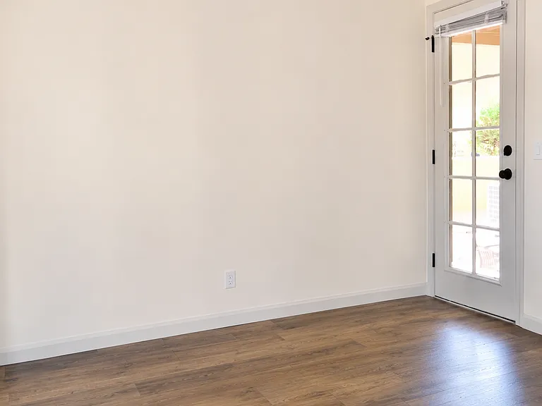 Dedicated dining area with a door to the back porch