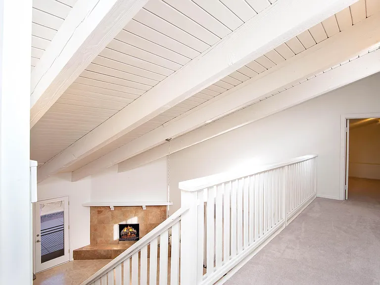 Loft space with walk in storage closet