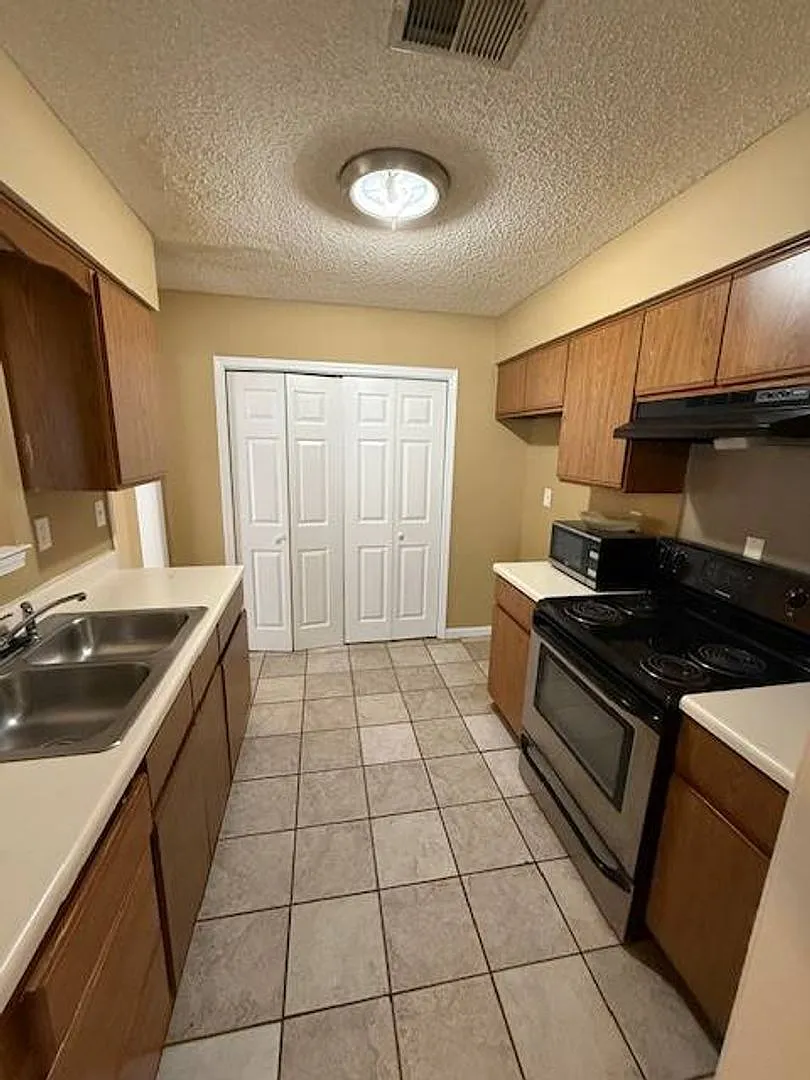 4 Success Realty is now offering this 2-bedroom 2-bathroom townhome — Photo 2