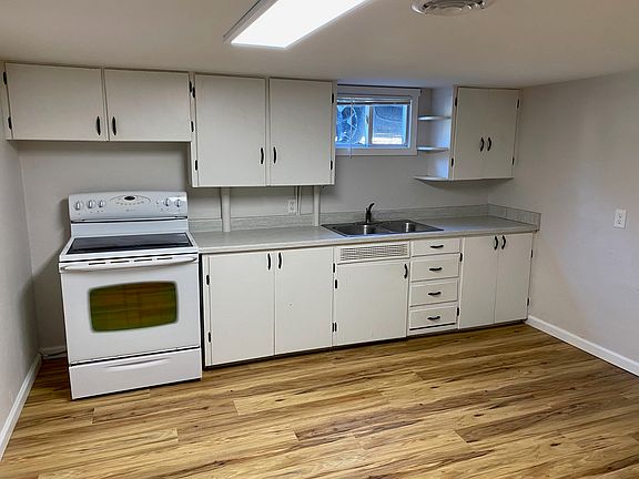 Large eat-in kitchen, with easy to clean wood-look floors.