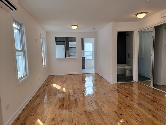 Living Room / Dining Room / Kitchen View/ Bathroom Entrance