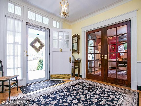 Entrance Foyer with pocket doors on each side.