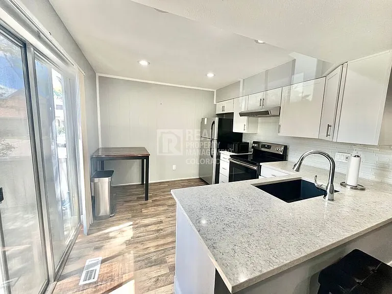 2441 S Xanadu Way #A — Photo 2