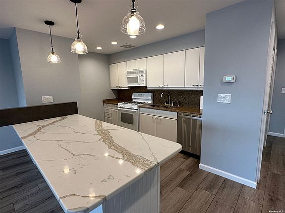 5th image of 75 E Broadway APT 6B