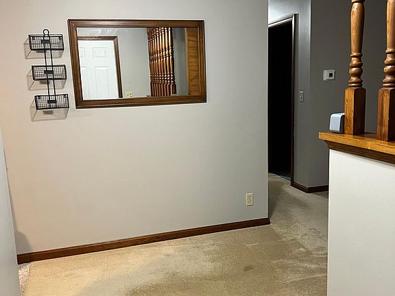 View from front entry. Mirror and mail holder to remain.