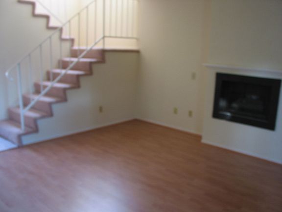 Fireplace and stairs up