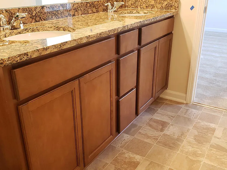 double vanity with granite countertops in master bath