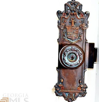 Antique hardware on front door with special significance