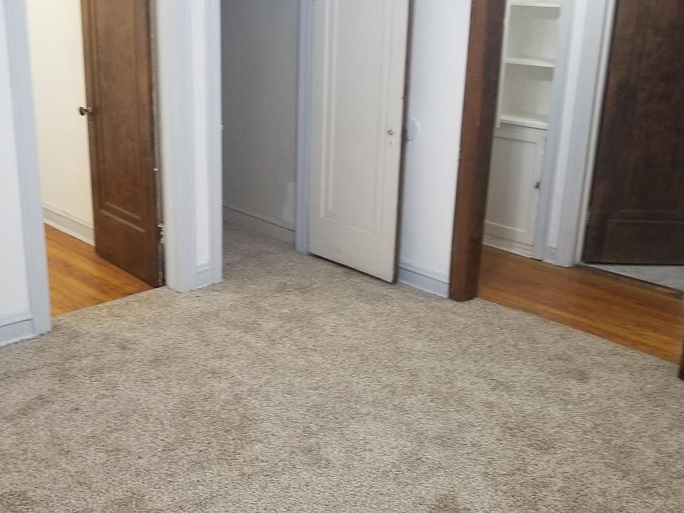 Entrance to apartment showing bedroom, closet and hallway
