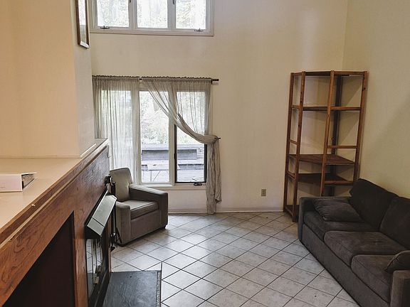 living room with wood fireplace