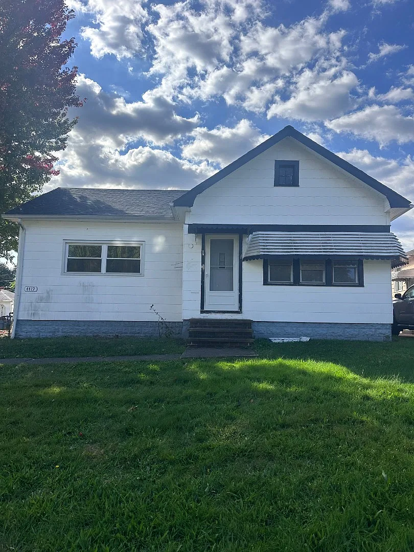 Renovated 3-Bedroom House in Parma | Garage + Water, Sewer & Garbage Included — Photo 1