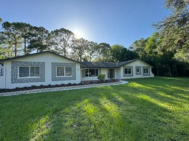 1st image of 4901 N 129th Ave Avenue N