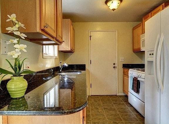 Kitchen with door to the garage.