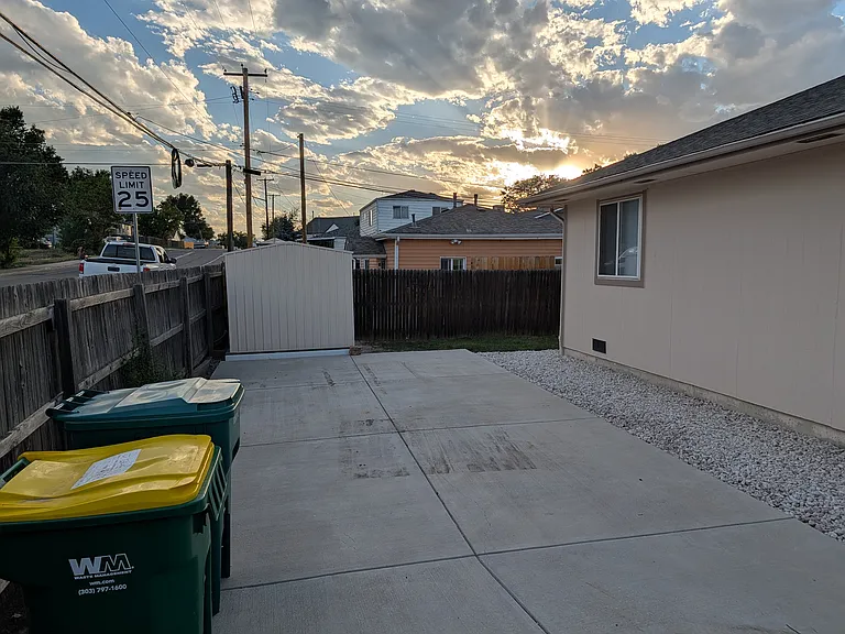 Side yard w/ parking