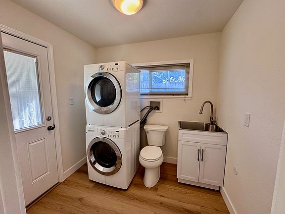Laundry room with half bath