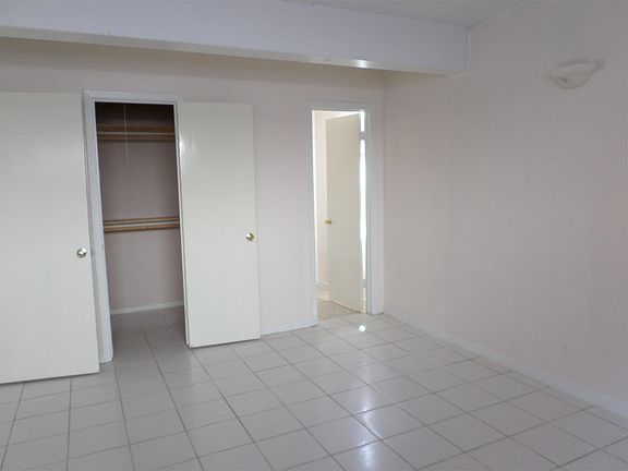 Master bedroom with walk-in closet