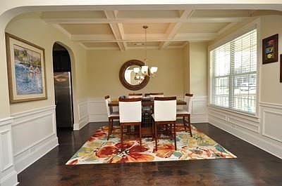 Spacious dining room with coffered ceiling