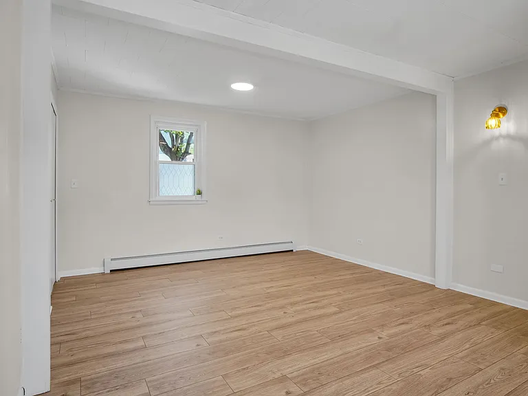 Large living room, brand new electric baseboard heating