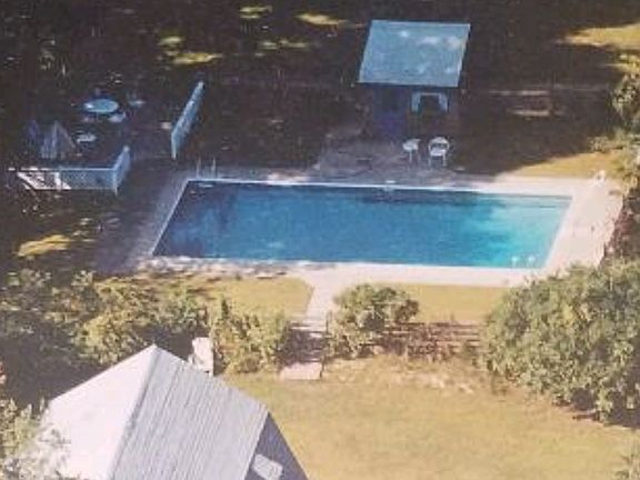 fenced in-ground pool/cabana