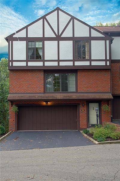 Welcome to 801 Timber Lane.  Impeccably maintained end-unit featuring level driveway and motion sensor light. HOA amenities incl