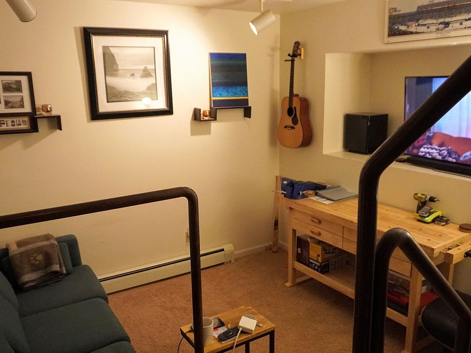 Looking at den from the stairway