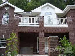 Many quality improvements by present owners, elevator installed for easy access to upper main level,