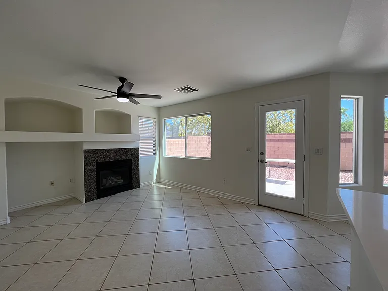 The family room area leads to the backyard and is open to the remodeled kitchen.
