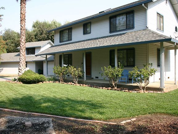 Angle view of house, 2 car garage, breezeway and 24x40 shop