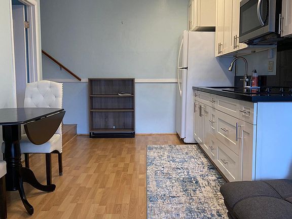 Fully equipped kitchen and dining area.