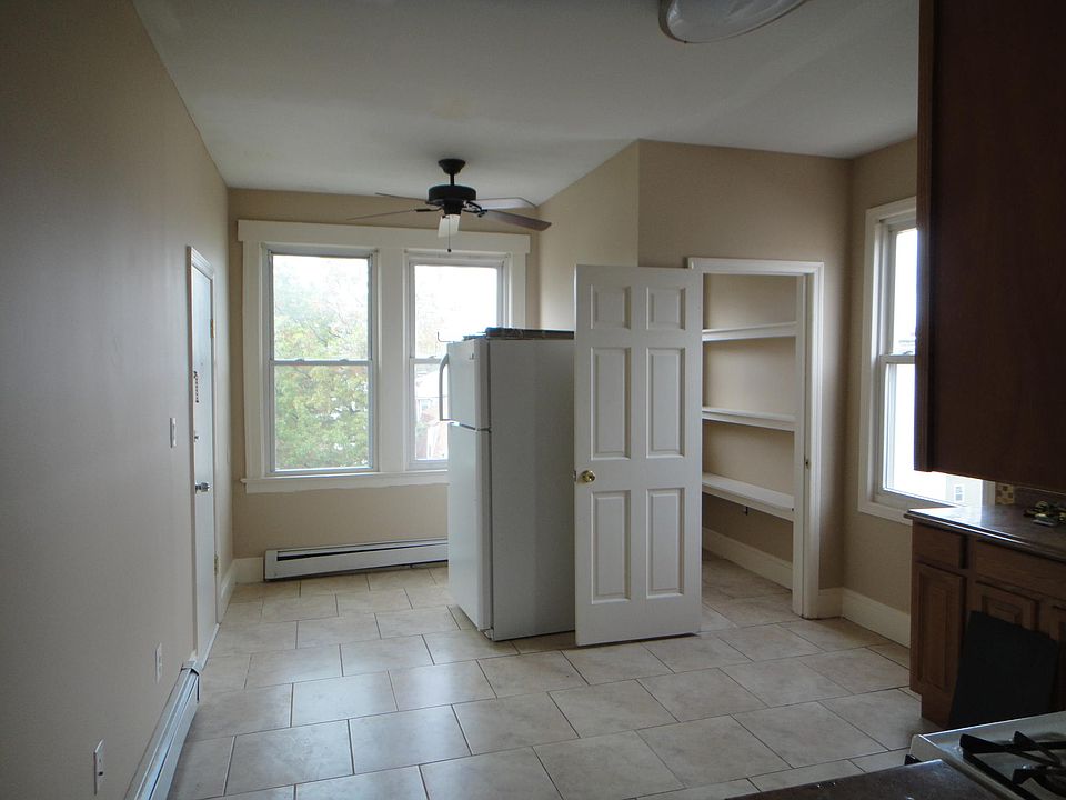 Kitchen area with walk-in pantry