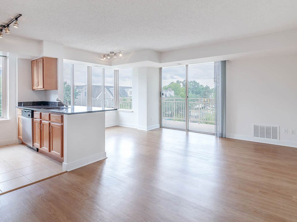 Living Room with Balcony and Hard Surface Flooring