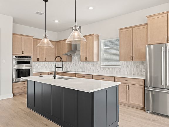 The kitchen has a convenient kitchen island.