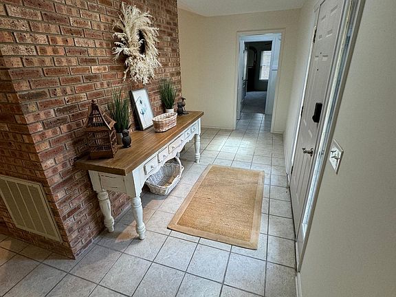 Inviting natural brick entryway