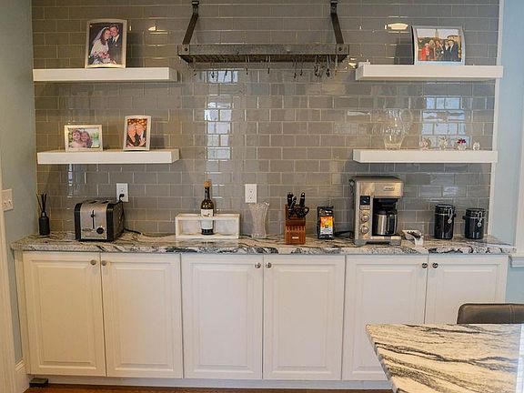 Pot rack and built-in cabinets