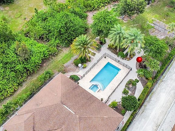 Aerial view of property back yard