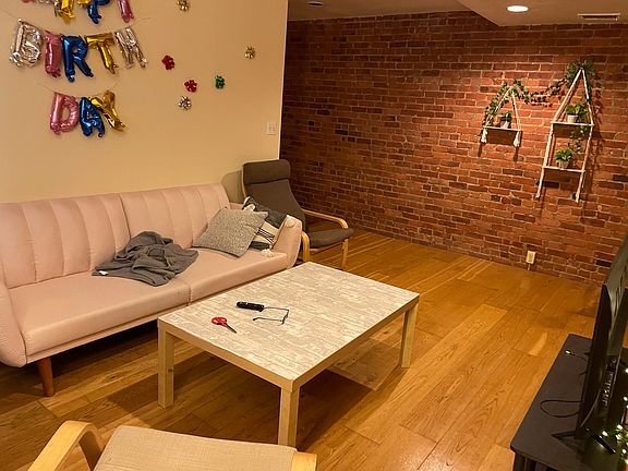 Living Room with Exposed Brick