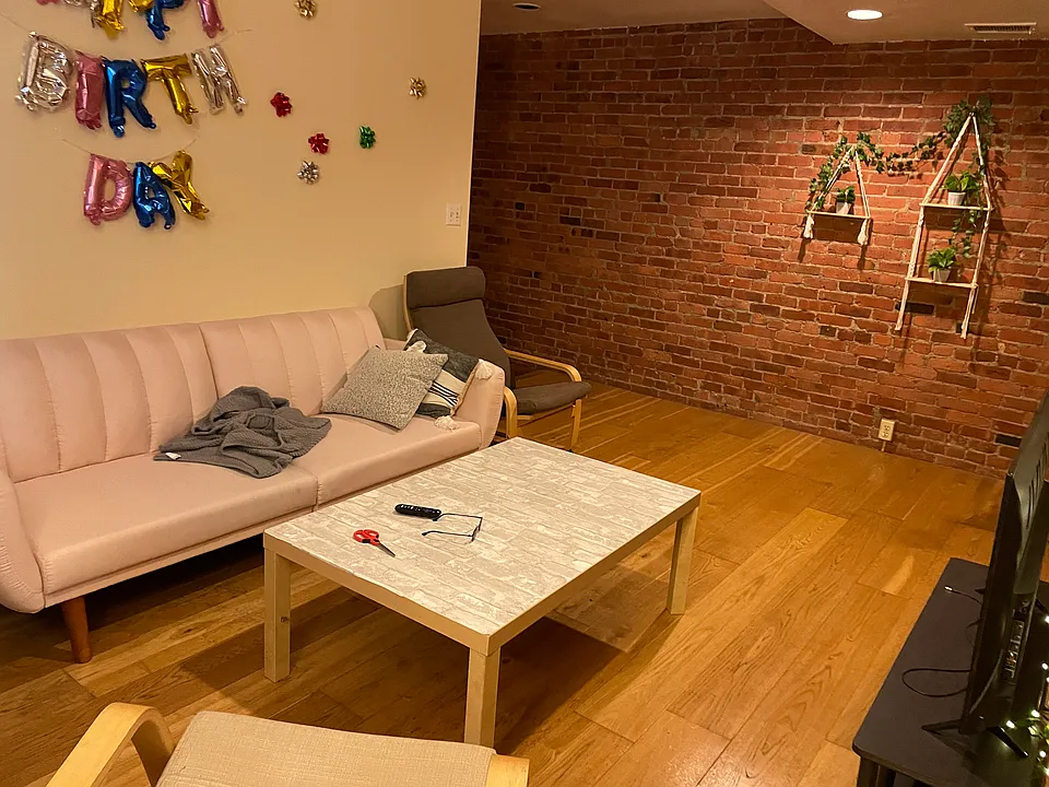 Living Room with Exposed Brick