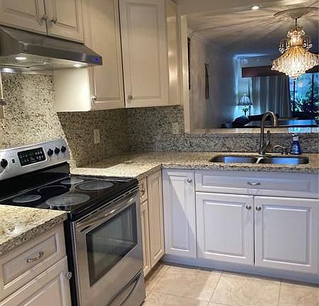 5th image of 3755 Carambola Cir N #2818