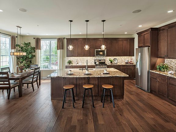 Spacious kitchen with adjacent casual dining area