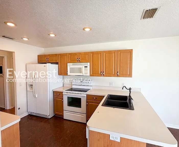 6930 Frascati Loop — Photo 5