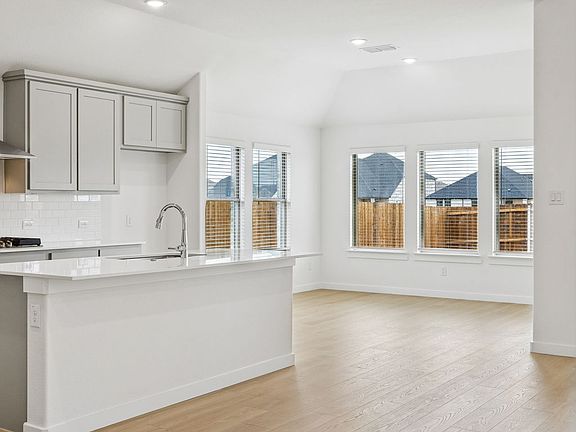 Open Floor Plan in the Gilmour II home plan by Trophy Signature Homes - REPRESENTATIVE PHOTO