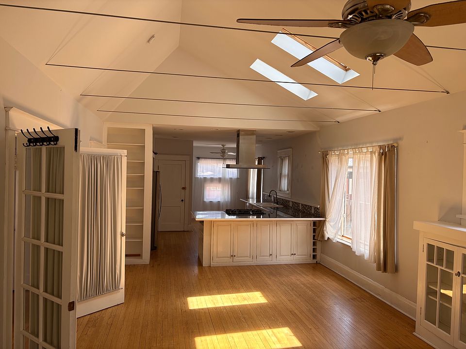lofted main room looking toward kitchen