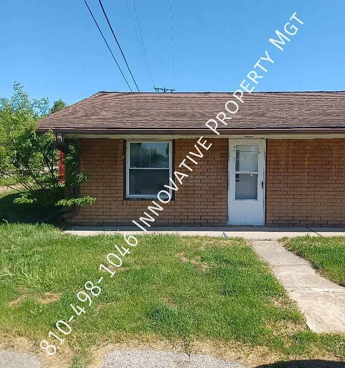 7351 N Dort Hwy #1