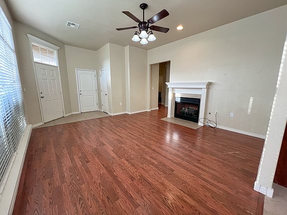 Gas log fireplace for emergency heat or cozy ambiance.