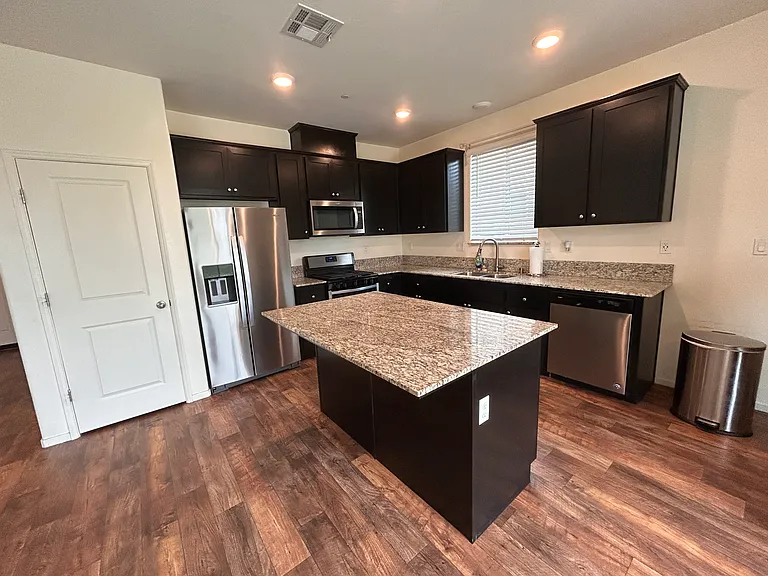 spacious island for your bar stools and additional seating area