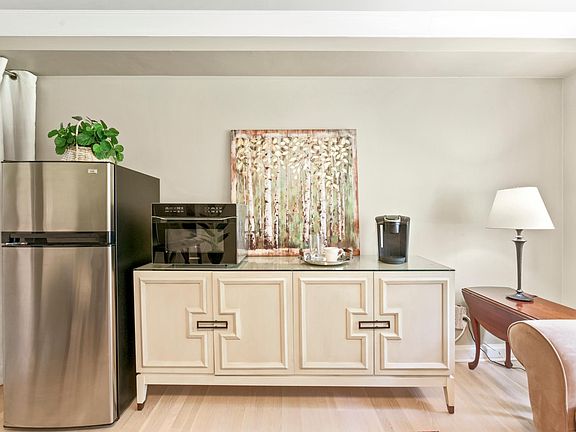 Guest refrigerator, convection microwave, coffee maker, toaster and dishes